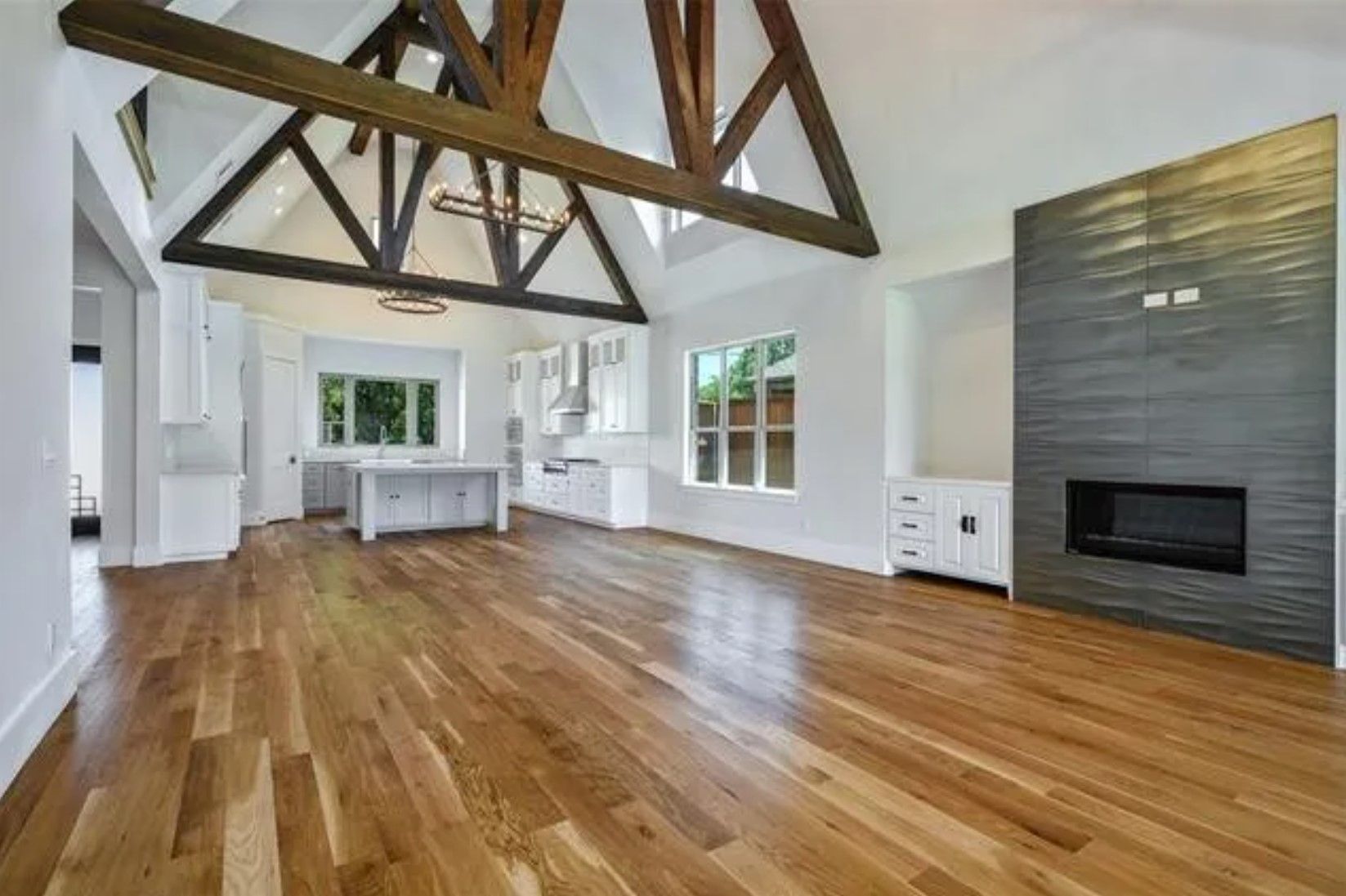 Vaulted great room with timber trusses
